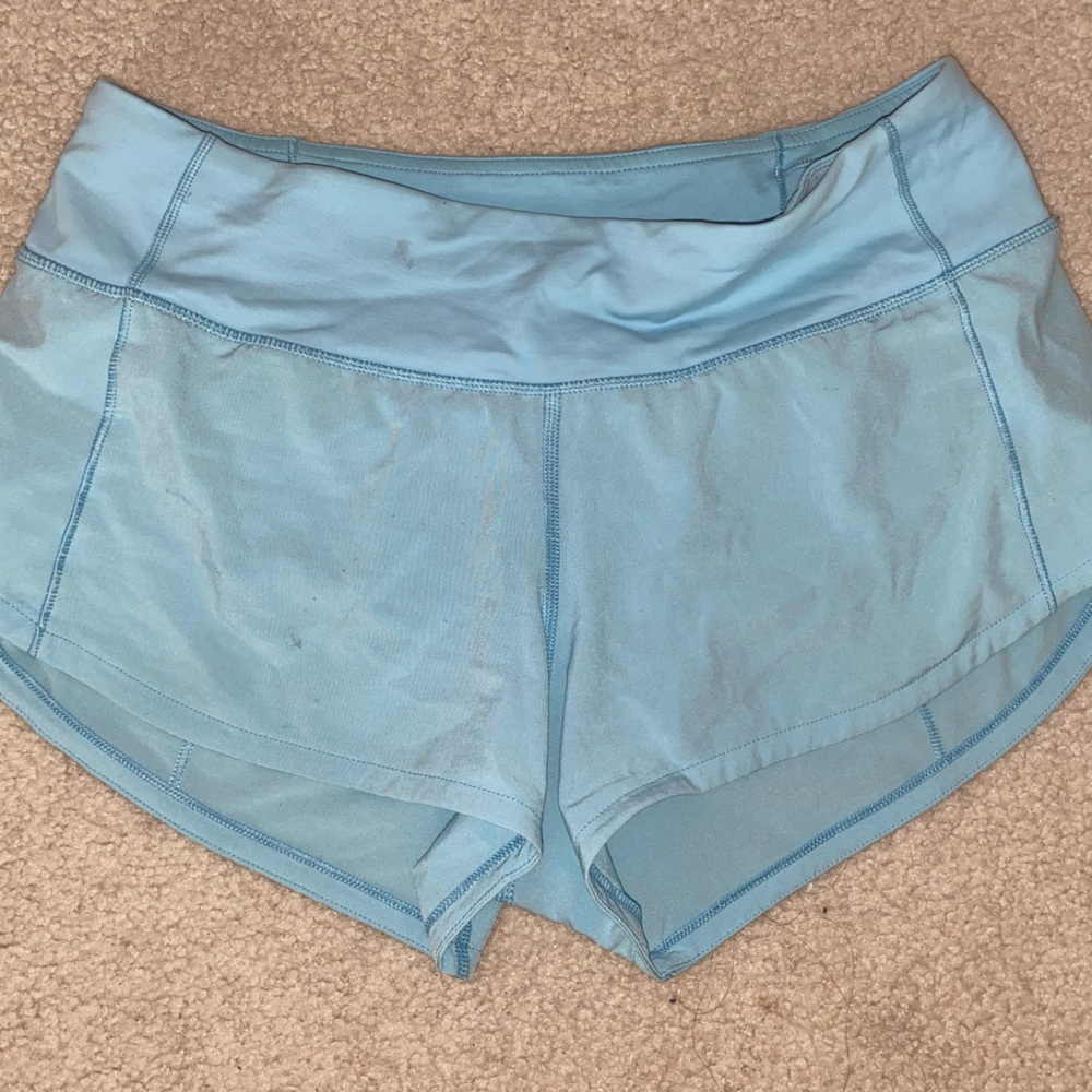 Light blue lululemon speed-up shorts.